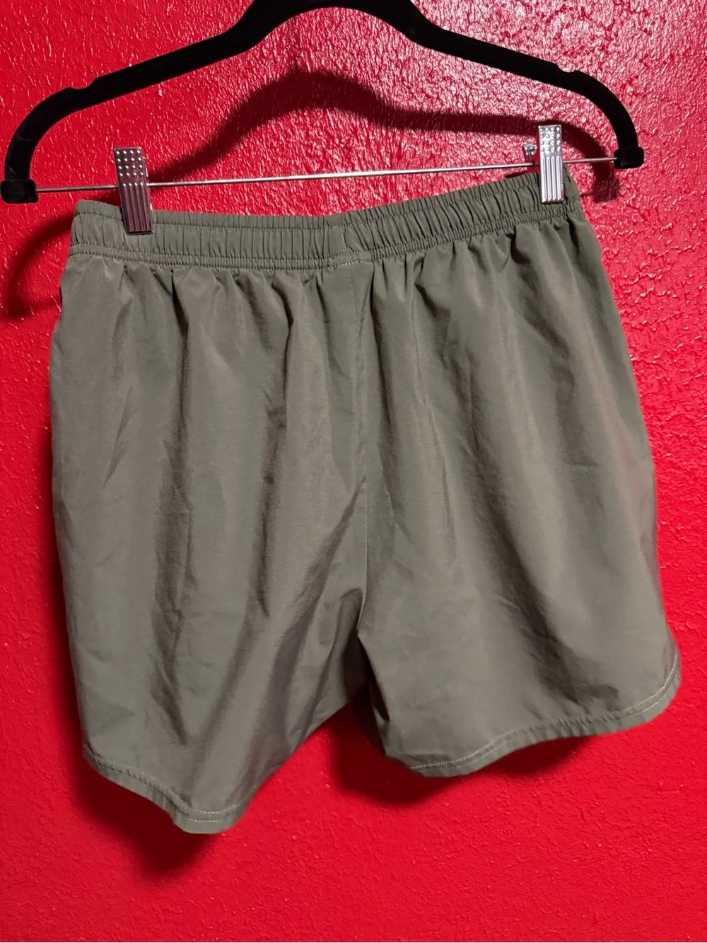 27. Preloved Men’s Gymshark Olive Green Athletic Drawstring Shorts